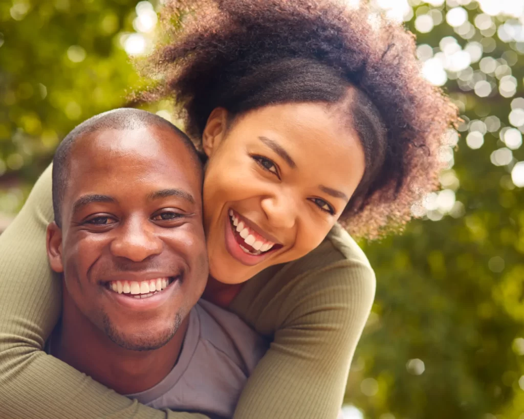 portrait of loving couple hugging outdoors in coun utc